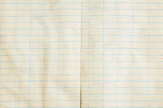 An old notebook with a grid on it photo