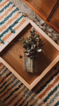 A wooden tray with a plant on it photo