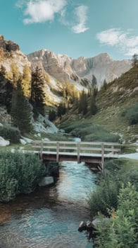 Bridge over river in mountains photo