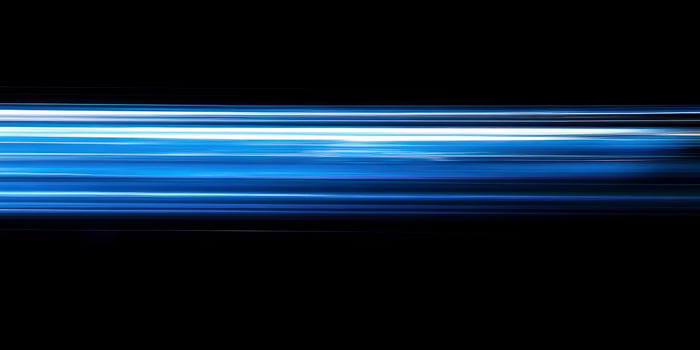 Abstract Blue Light Trails Streaks Over Black Background for Modern Designs photo