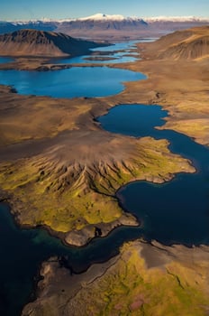 Aerial View of Icelandic Landscape with Lakes and Distant Snow Mountains photo