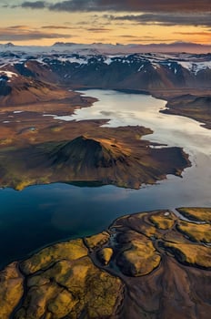 Aerial View of Iceland's Mountains and Lake at Sunset for Exploration photo