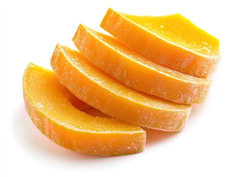 Dried Mango Slices Stacked Deliciously on White Background for Snack photo