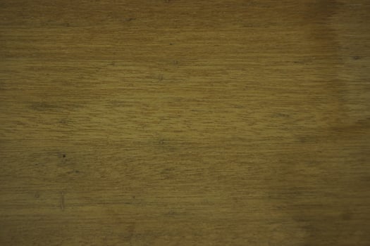 Closeup of Textured Natural Wood Grain with Warm Tones and Subtle Imperfections photo