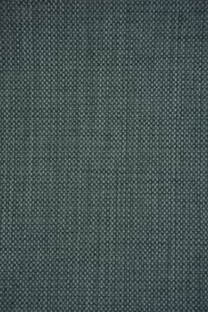 Textured fabric surface in subtle shades of green suitable for design projects photo