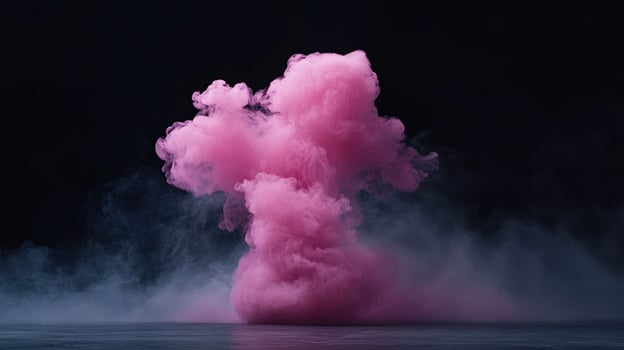 A vibrant pink smoke cloud billows against a dark backdrop. photo