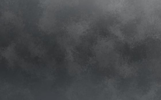Textured silver surface with a rugged appearance, combining various shades to create a dynamic and industrial feel. photo