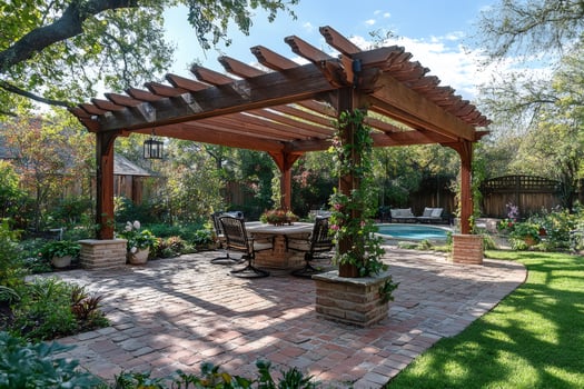 Wooden pergola providing shade on brick patio in lush backyard photo