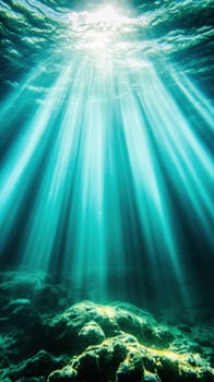 Sunlight beams penetrating clear ocean depth creating ethereal underwater seascape with vibrant aquatic colors photo