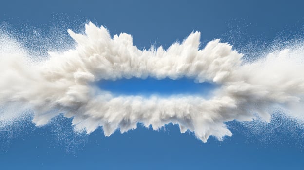 An abstract explosion of white clouds against a bright blue sky. photo