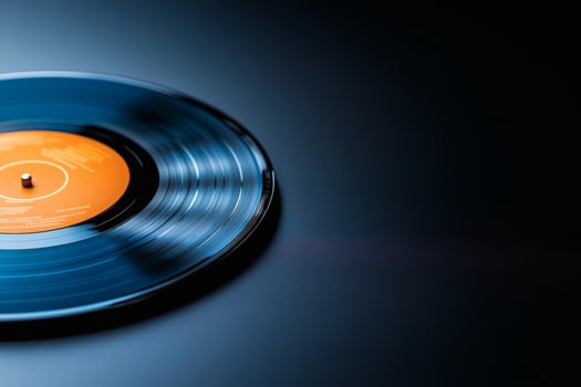 Vinyl record spinning in dim light photo