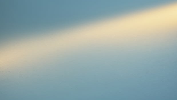 Subtle Blue Textured Background with Golden Light. photo