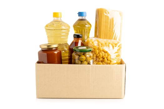Foodstuffs in donation box isolated on white background for volunteer to h photo