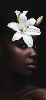 A black woman with flowers on her head photo