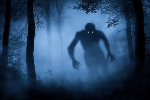 Creepy Creature Lurking in Foggy Forest at Nighttime Creating Mystery photo