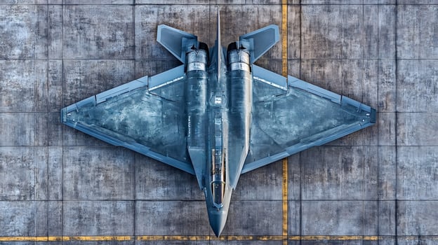 Modern fighter jet parked on concrete airfield photo