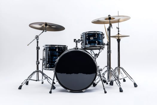 Blue drum set standing on white background in studio photo