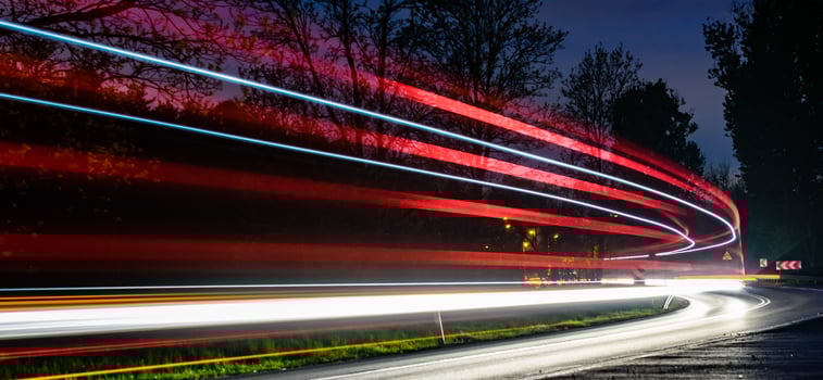 lights trails. abstract red car lights at night. long exposure photo
