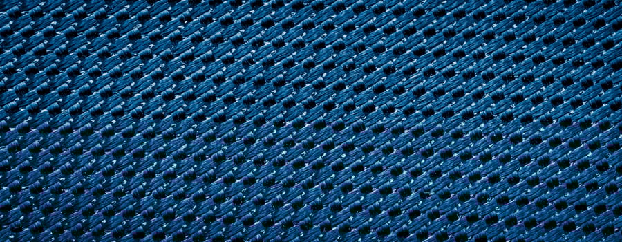 blue fabric with a visible texture. background photo