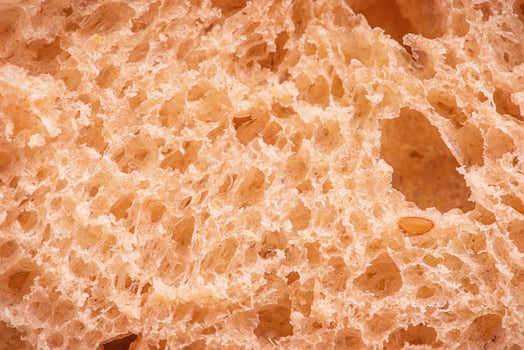 Macro photo of bread texture. Buckwheat bread as a background. Baguette macro.