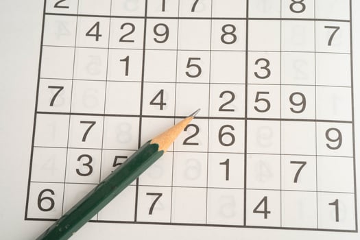 Sudoku puzzle, game to play for keep you brain younger for developing Alzheimer disease in senior photo