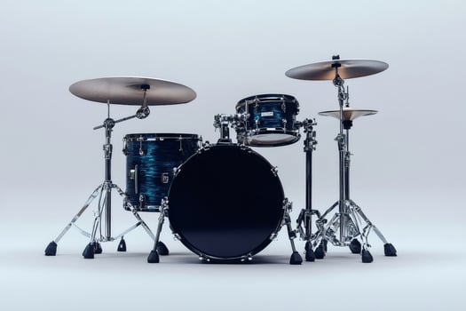 Blue drum set standing in a white room with cymbals ready to play photo