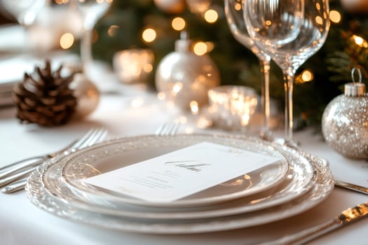 Christmas eve dinner table setting menu showing festive celebration photo