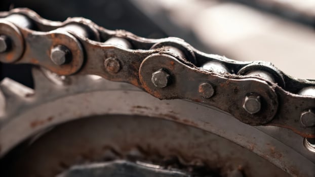 A close up of a chain on a bike photo