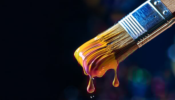Vibrant Paintbrush Dripping With Bright Colors and Capturing the Essence of Artistic Creativity photo