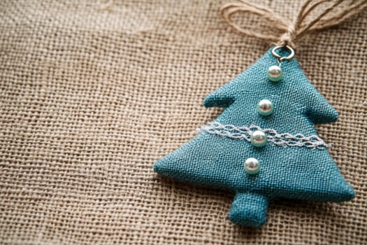 Christmas Tree Ornament on Burlap Fabric Rustic Holiday Decoration photo