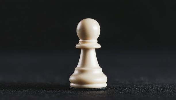 Illuminated White Pawn on Dark Background Macro Shot Chess Concept with Copyspace photo