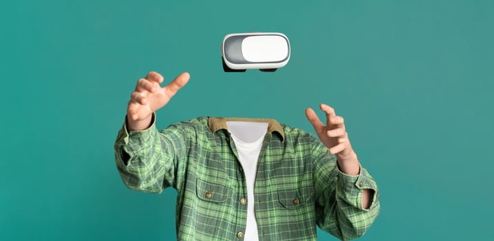 A person is interacting with virtual reality goggles, with no head or face visible. The individual reaches out in a bright, isolated environment, emphasizing technology and modern gadgetry. photo