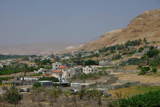 A view of the town of israel from the top of a hill photo