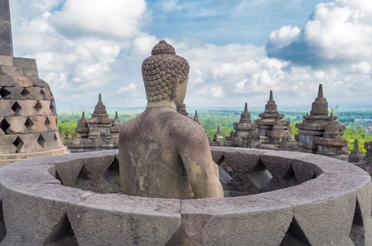Buddha statue at borobudur temple, indonesia photo