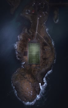A soccer field on an island in the middle of the ocean photo