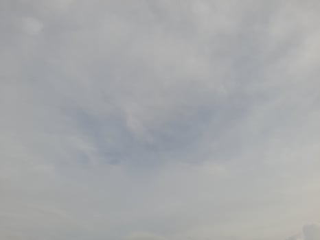 White clouds in the blue sky. Light cloudy, good weather photo
