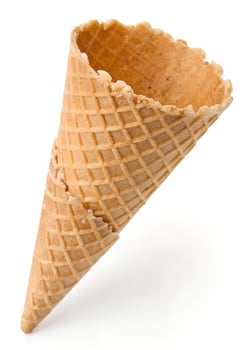 Ice cream cone is shown on a white background photo