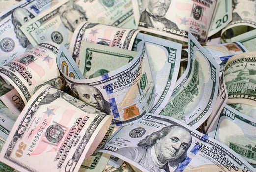 Background of twisted pile of dollar bills photo
