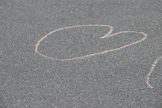 Chalk Heart Drawing on Asphalt photo