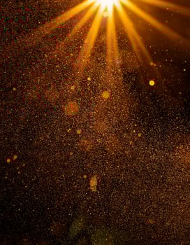 Golden Rays Illuminate Sparkling Dust Particles in a Warm, Glowing Ambiance During Late Afternoon photo