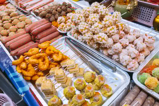 Fast food at Asian night market in Asia. Traditional Vietnamese street food on the counter in Vietnam in Da Nang photo