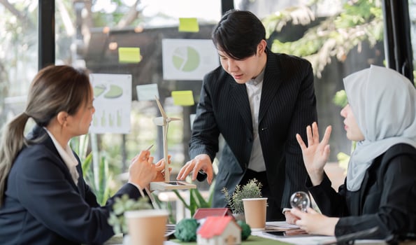 Sustainability and Team Collaboration. A business meeting focused on sustainable practices and environmental solutions among professionals. photo