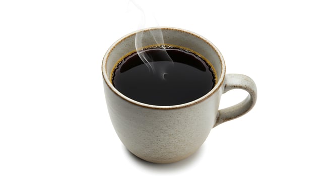 Steaming Black Coffee in Rustic Mug Isolated on White Background photo