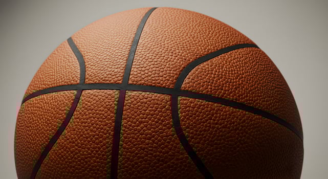 Close-up Detail of a Basketball with Leather Texture and Black Lines, for Sports Enthusiasts photo