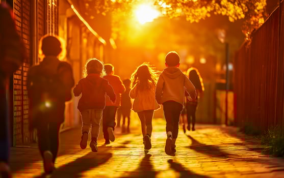 Cheerful multiethnic kids playing running on blurred background in park. Horizontal view. photo