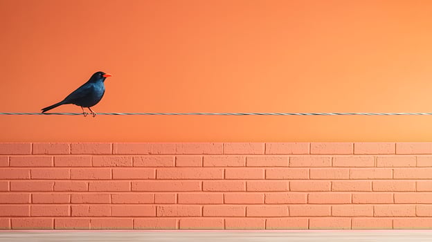 A solitary blue bird perched on a wire against a vibrant orange wall, showcasing urban tranquility photo