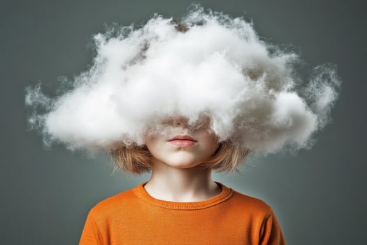A child with a cloud over their head photo