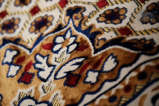 Close up of a colorful rug with a floral design photo