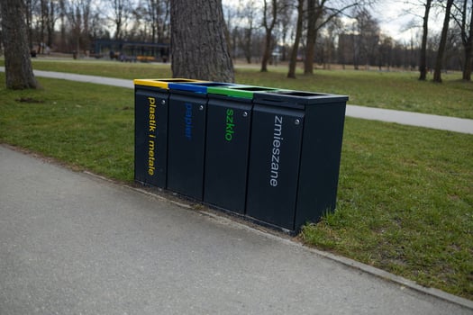 Trash Bins for Recycling in the Park, Different Containers for Waste Sorting photo