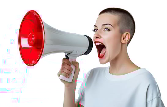 Young woman passionately shouting through a megaphone in a dynamic expression promoting social awareness and diversity in an urban setting photo